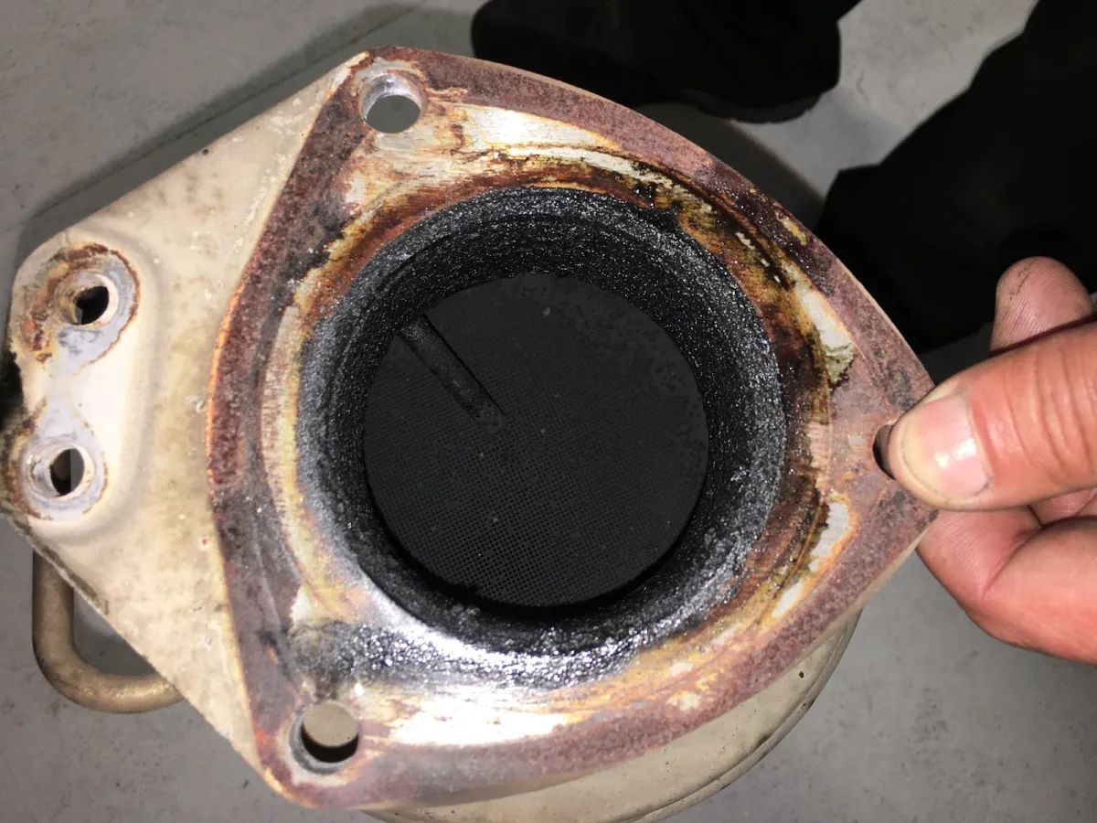 Blocked Saab DPF clogged with soot before cleaning